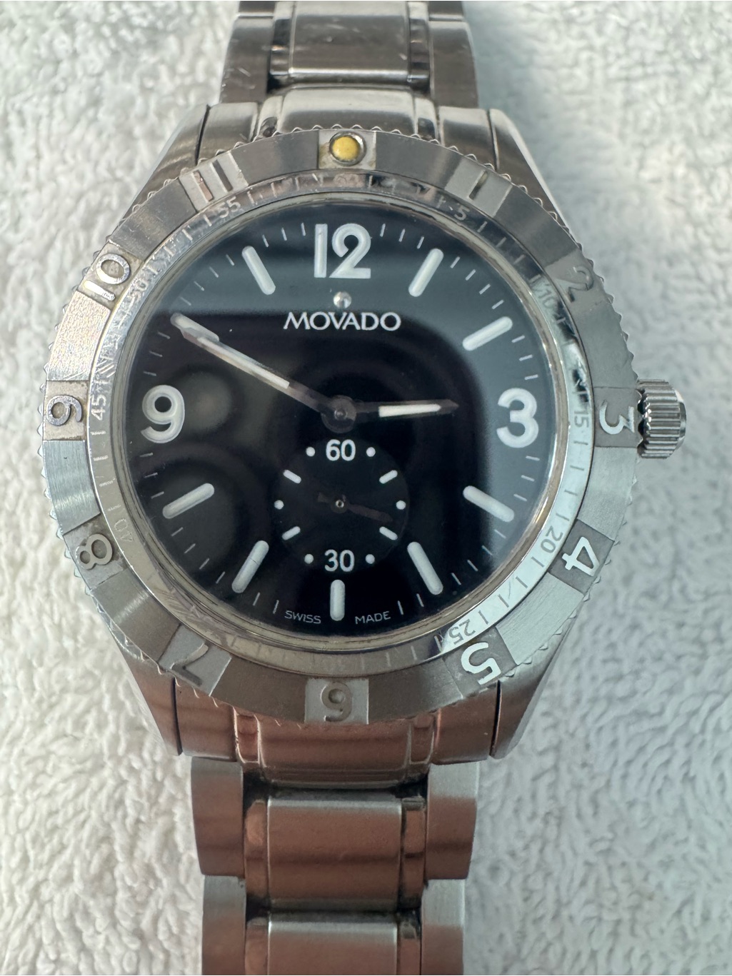 147 Movado Stainless Steel Watch With Black Dial And Silver Bracelet